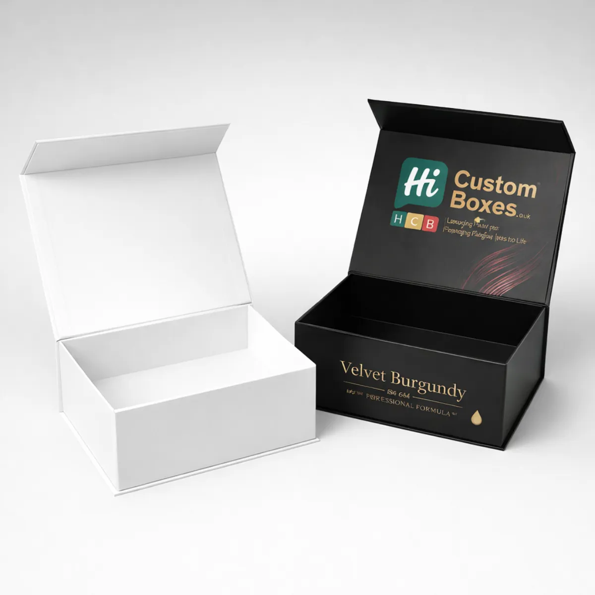 Two premium magnetic lid boxes, one plain white and one matte black with gold foil text. class=